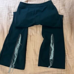 Dressy pants with metal dangle/tassle